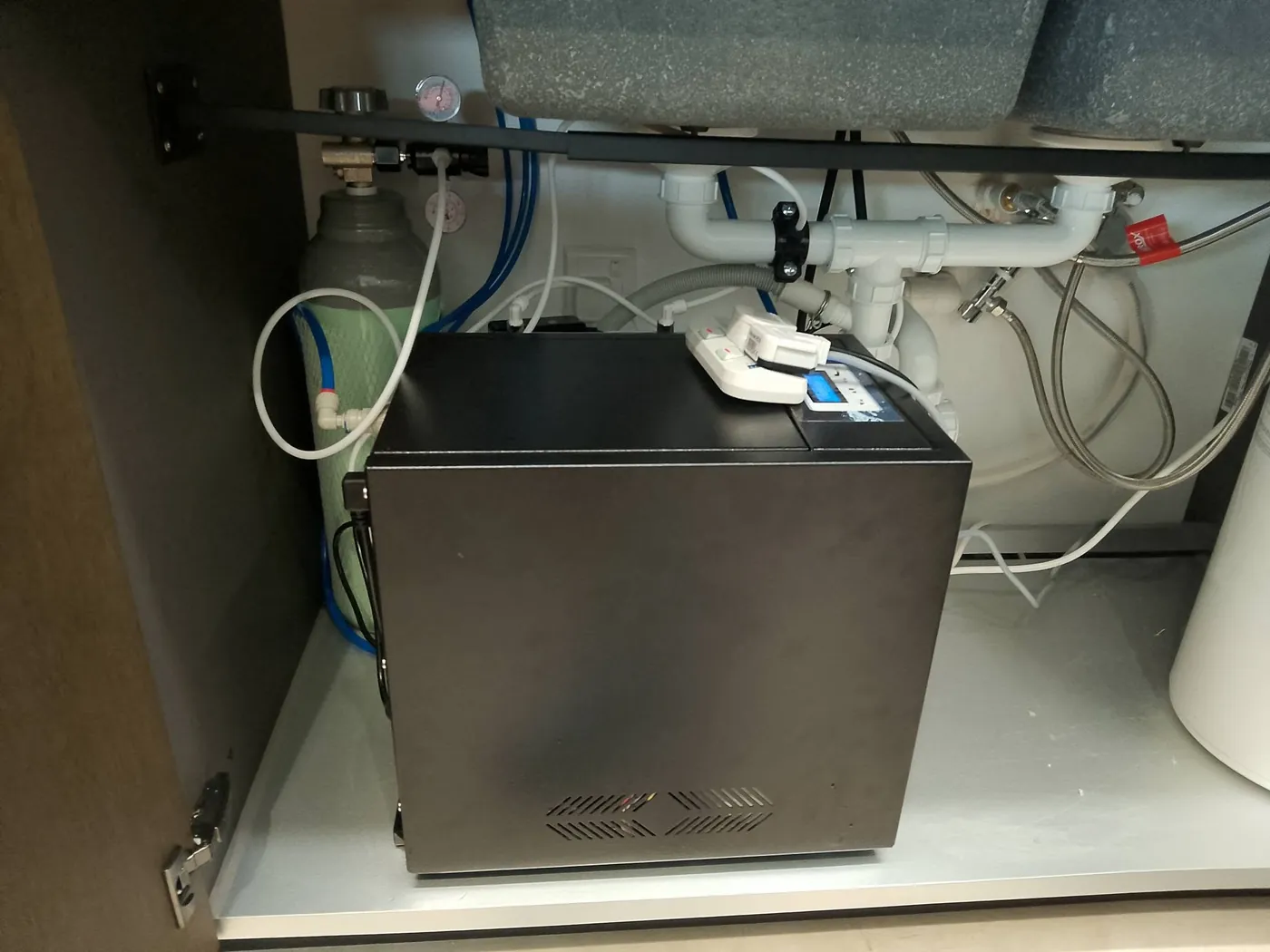 RO-400 Sodabar installed in a kitchen cabinet under the sink